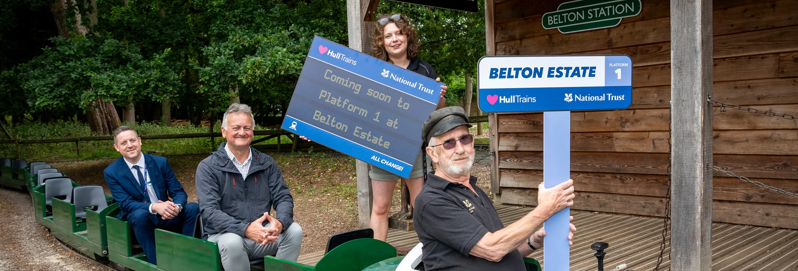 A group of people at Belton Estate on a miniature train