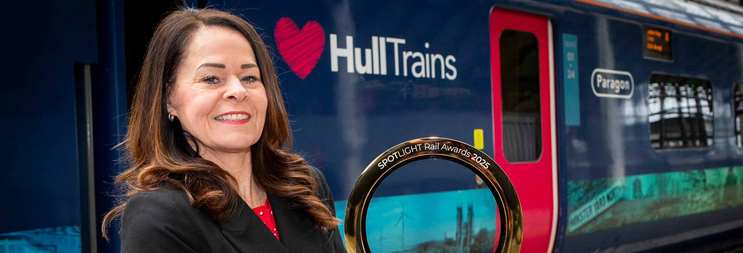 A photo of Louise Mendham with the Hull Trains Spotlight Rail Award