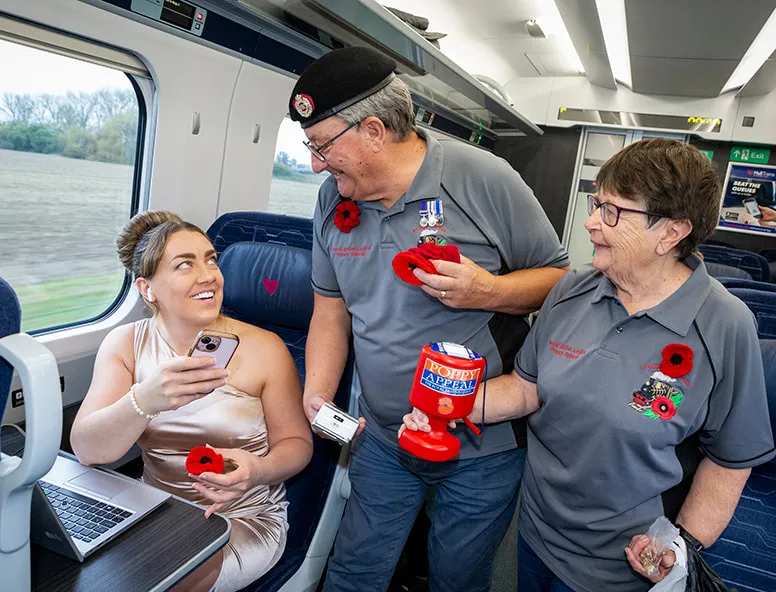Railway poppy seller onboard a Hull Trains service